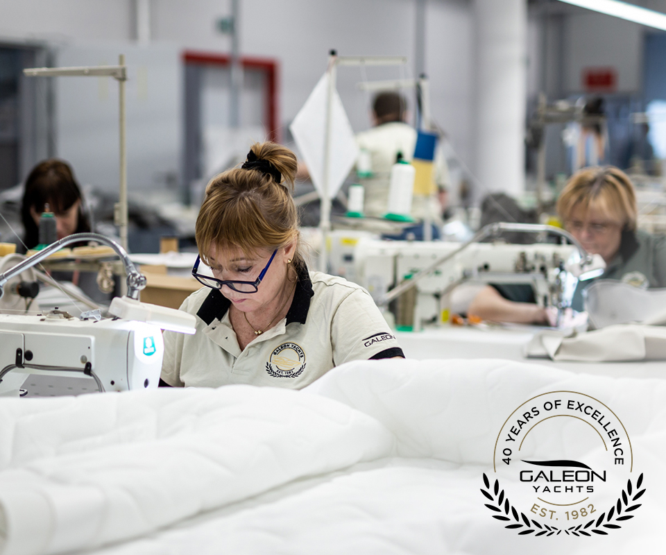 Women working on a sewing machine