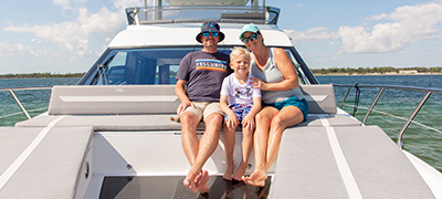 Family sitting on their galeon