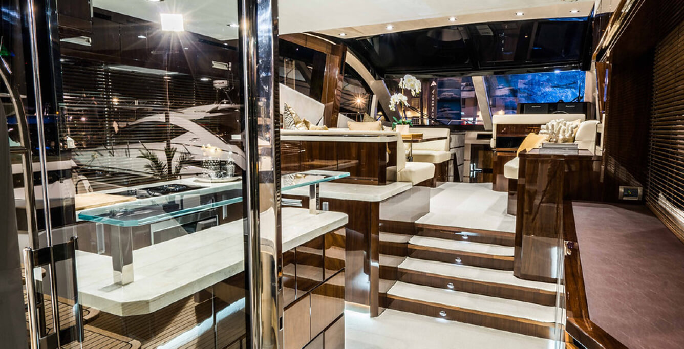 The kitchen, interior sitting area and a mirror inside a Galeon yacht