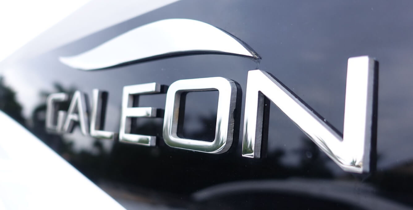 Closeup of the Galeon logo on the side of a yacht