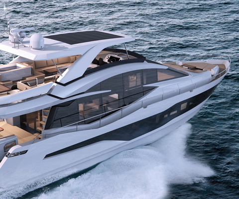Galeon yacht cruising on the water with tan seating areas and a white and black exterior